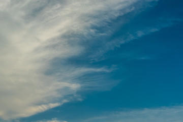 Fantastic soft white clouds against blue sky