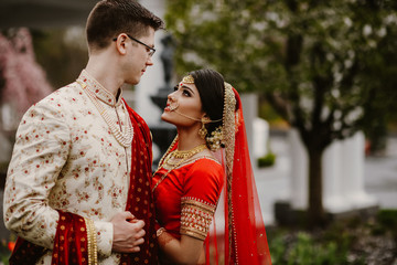 The beautiful brides Hindus look at each other with love