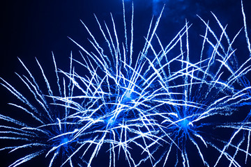 Blue fireworks in the night sky