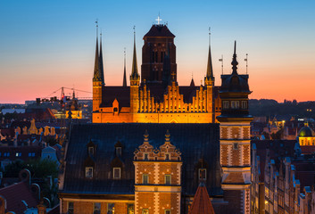 Fototapeta na wymiar St. Mary Basilica over the old town in Gdansk at sunset, Poland.