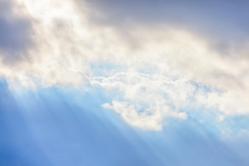 Obraz premium Blue sky and clouds with sun rays. Dramatic view. Background