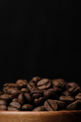 roasted coffee beans background close up. macro shot