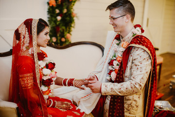 Happy Indians celebrate the day of their wedding