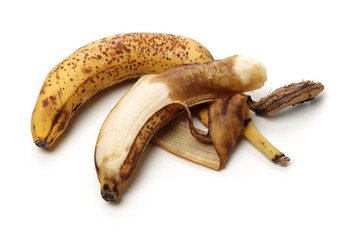 Overripe banana on white background