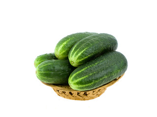 Cucumbers in a basket on a white background