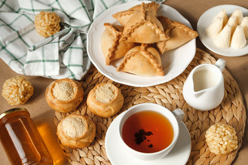 Tatar style breakfast. Traditional pastries, tea with milk and honey