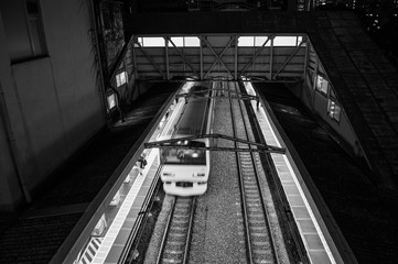 Tokyo JR train at Ochanomizu station platform at night