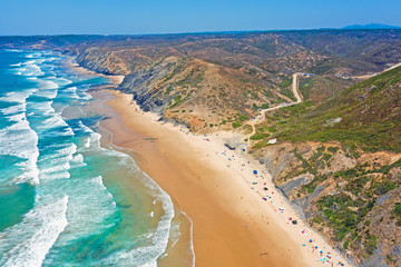 Aerial from Vale Figueiras beach on a beautiful summer day in Portugal