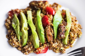 Buckwheat with avocado and red pepper.