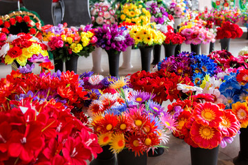 Sale of funeral accessories. Shop selling coffins, funeral wreaths and flowers