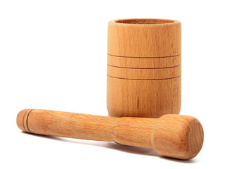 Wooden mortar and pestle on white background