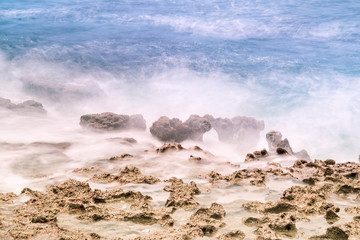 Mystic rocks at the ocean, long exposure. Grand Cayman Island