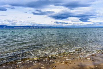 Lake Baikal and mountains of Siberia with beautiful sky and clouds, Russia Oklhon island