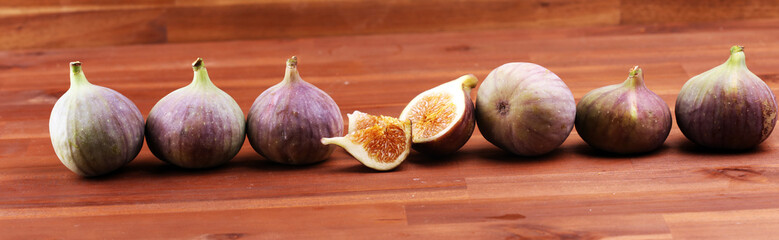 Fresh figs. Food Photo. whole and sliced figs on rustic background.