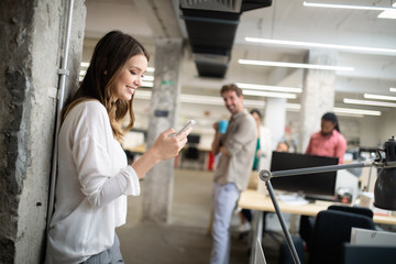 Business woman with her staff, coworker people group in background at office