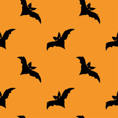 Seamless pattern with halloween carved jack faces silhouettes on black background. Can be used for scrapbook digital paper, textile print, page fill. Vector illustration