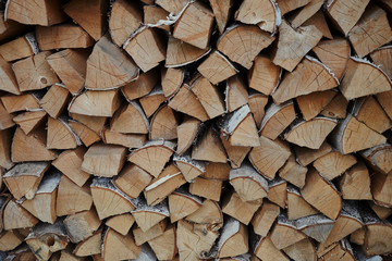 Abstract photo of a pile of natural wooden logs background
