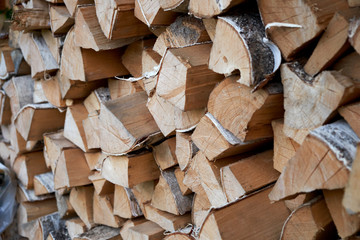 Abstract photo of a pile of natural wooden logs background