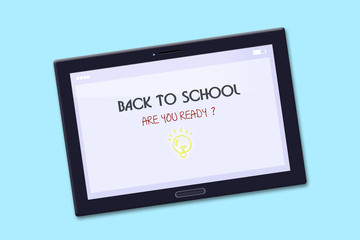 Inscription Back to school, you are ready, on the tablet screen. On a blue background. Isolated. Background.