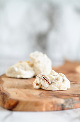 Keto butter pecan fat bombs. Made with pecan nuts, coconut oil and butter. .Selective focus with blurred background. Ketogenic diet concept .