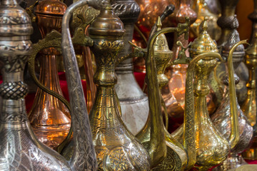 Decorative old style metal pitchers for sale; Istanbul, Turkey.