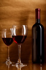 Bottle and Glasses of Red Wine