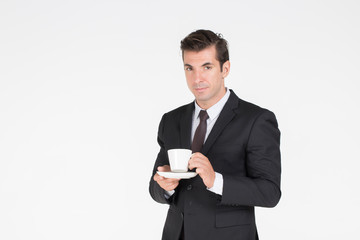 handsome business man standing  drink coffee smart and confident