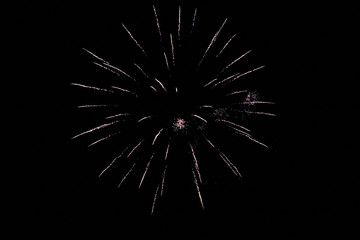 isolated fireworks on a black night background