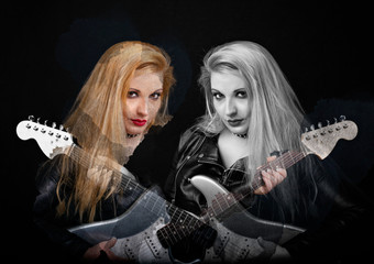 Beautiful blonde girl in rock style on a black background.