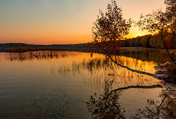 Autumn sunset on lake