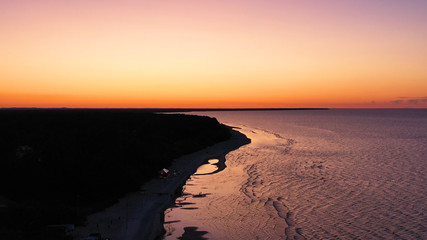Aerial view wonderful dark silver sea with sunset twilight sky in the evening time. Scenery moment. spirit of serene and zen. image for background, wallpaper, interior