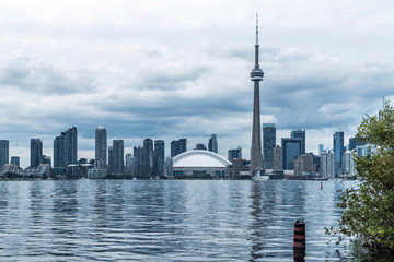 Waterfront view of Toronto City Skyscrapers along with CN Tower, Scarborough districts in summer, a view from Toronto Central Island, Toronto, Ontario, Canada