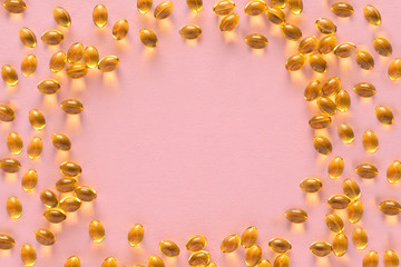 Close up capsules of fish fat oil in the heart shape, omega 3,