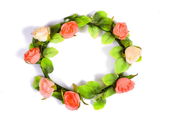 Floral round crown or wreath with rose flowers.