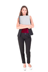 Fototapeta premium Full length portrait of beautiful standing posing young woman and holding a ducument folder and looking straight at the camera, isolated on white background.