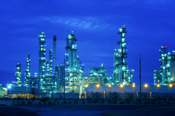 Industrial view Oil refinery and oil tanks plant during at blue sky