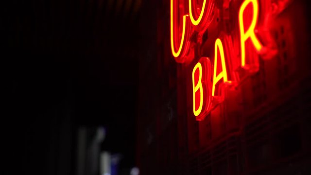 Red bar neon sign with black copy space
