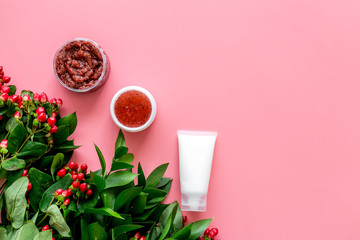 skin care with natural cosmetics with herbal extract on pinnk background top view mockup