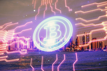 Double exposure of crypto currency theme hologram drawing and city veiw background. Concept of...