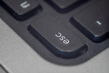 Close up of the esc key on a keyboard