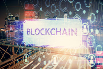 Multi exposure of cryptocurrency theme hologram drawing and city veiw background. Concept of...