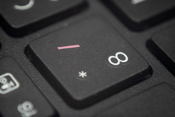 Close up of the number eight key on a keyboard