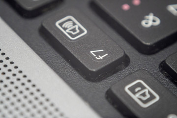 Close up of the f7 key on a keyboard