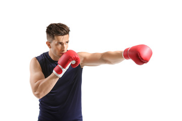 Sporty male boxer on white background