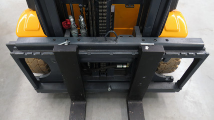 Forklift Truck hydraulic loader. Top view of Yellow Black Fork hoist . Eletric counterbalance...
