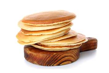 Stack of tasty pancakes on white background