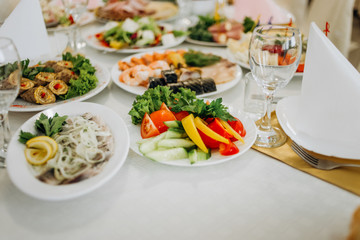 Wedding banquet tables with snacks