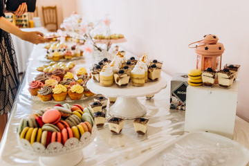 Pieces of cakes on a banquet table