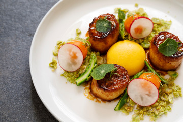 King oyster mushroom scallops, confit yolk and wasabi peas crumbs