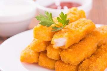 Fried fish sticks ( fingers ) or chicken nugget